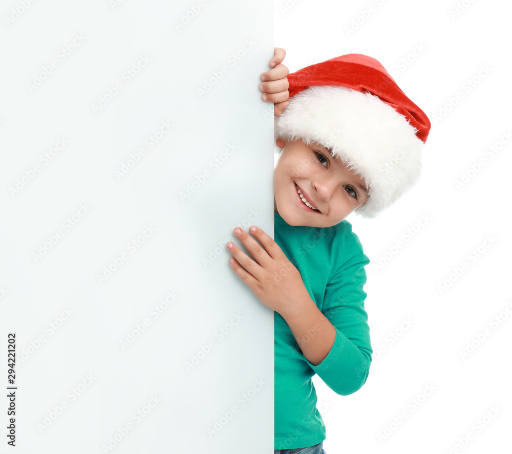 Cute little child wearing Santa hat on white background. Christmas holiday Cute little child wearing Santa hat on white background. Christmas holiday