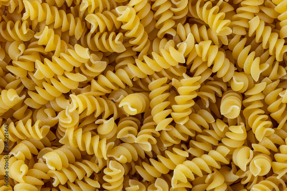 background of rotini pasta background of rotini pasta