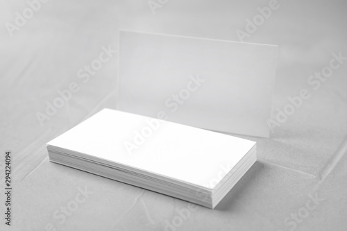 Stack of empty sheets on grey stone table. Mock up for design