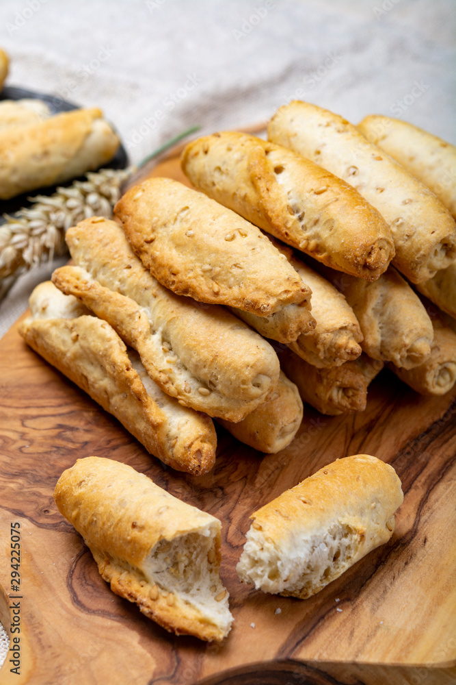 Small italian bread rolls crostini made from wheat dough with sesame