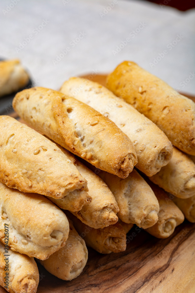 Small italian bread rolls crostini made from wheat dough with sesame Small italian bread rolls crostini made from wheat dough with sesame