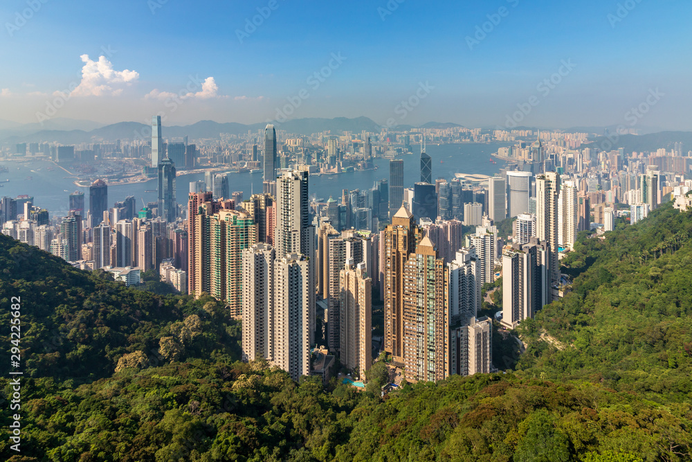 Panorama of Skyscrapers, Victoria Harbour and Hong Kong Bay. Taken from Victoria Peak Park on Hongkong Island. Hong Kong, China