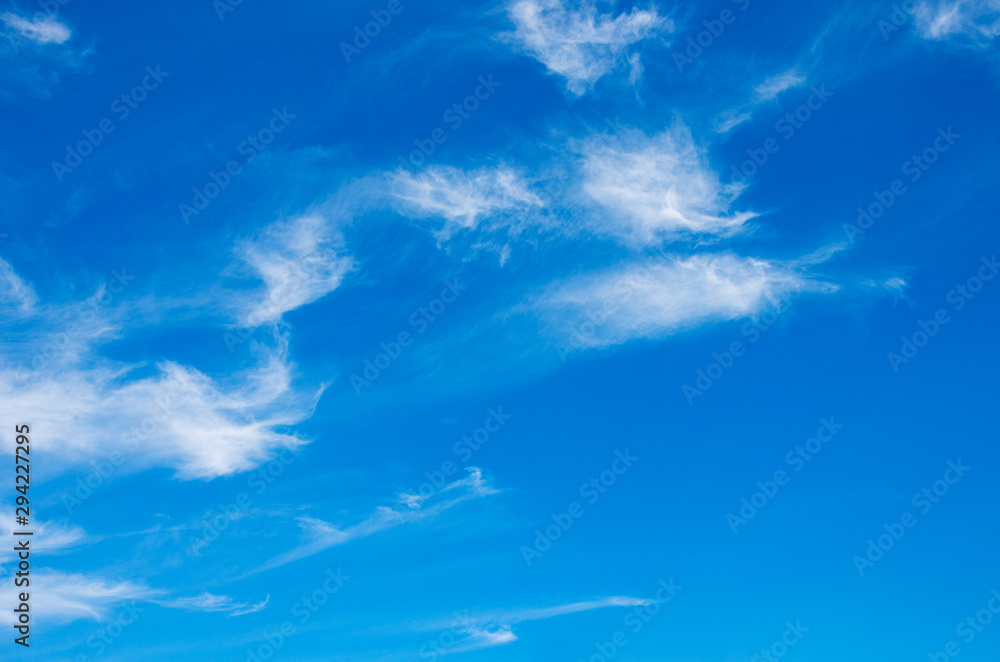 White clouds in blue sky.