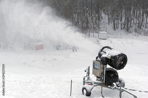 Snow cannon on the ski slope.