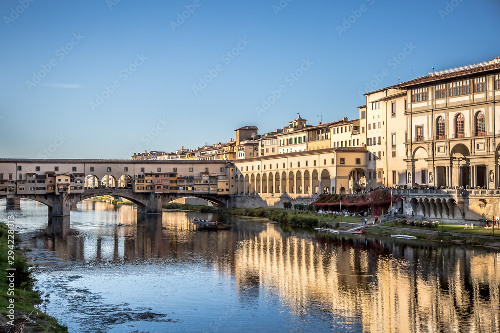 View from the banks of the river Arno on the Ponte Vecchio, Florence, Italy