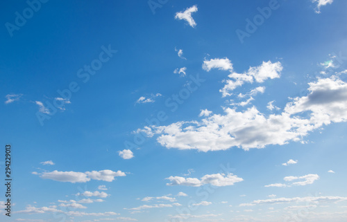 White clouds in blue sky.