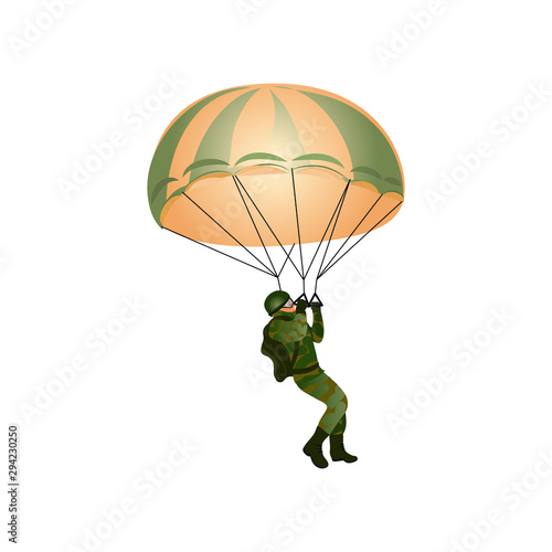 Photo A paratrooper in a military uniform flies with a parachute