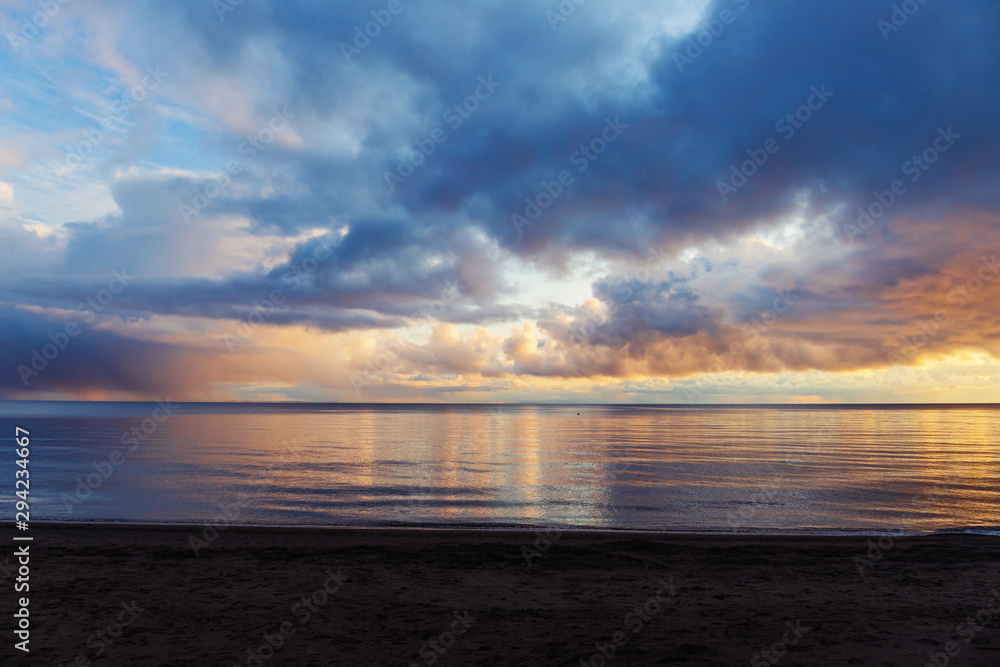 sunset on the beach at Baltic sea sunset on the beach at Baltic sea