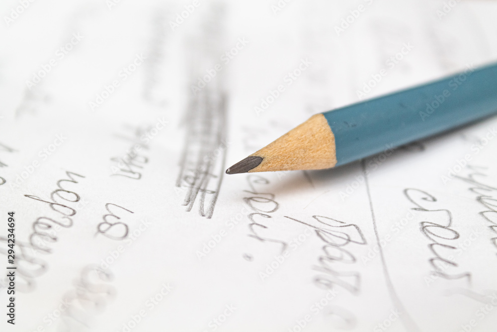 simple pencil on scribbled paper simple pencil on scribbled paper