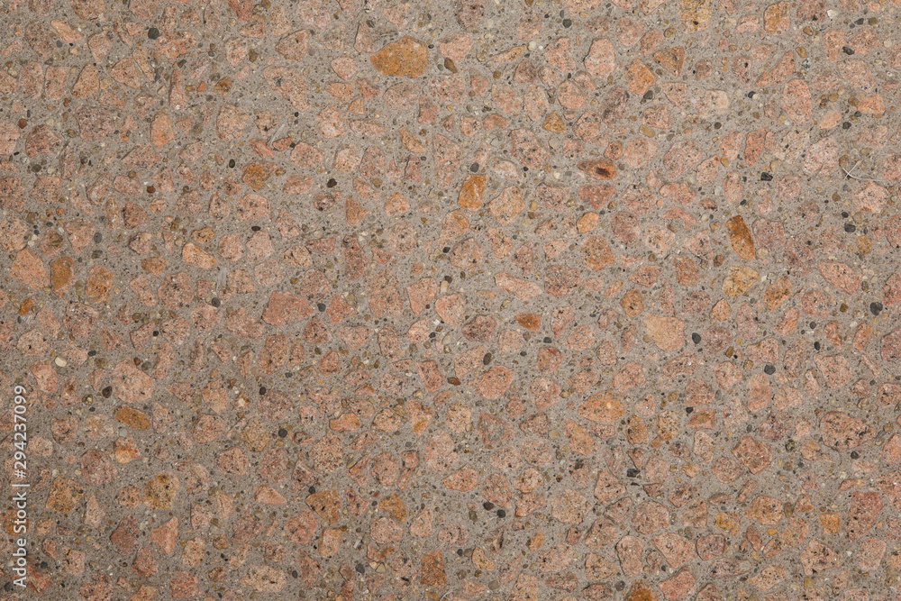 Gros plan texture béton désactivé avec graviers rose Gros plan texture béton désactivé avec graviers rose