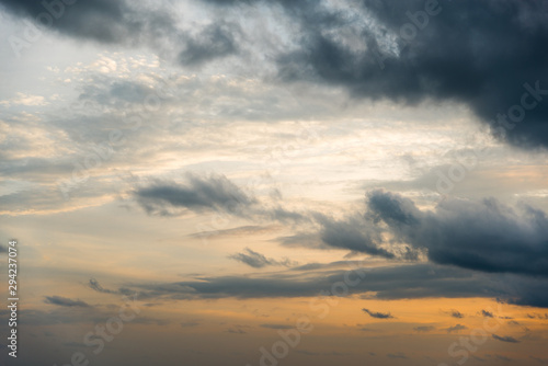 Beautiful view of sky and cloud at dusk,Sky Bright Blue Orange And Yellow Colors in twilight after sunset time.