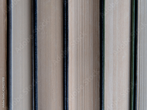 old books stacked in piles