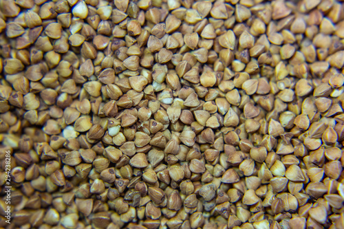 Background, texture, the rump. Buckwheat. Roasted buckwheat. Useful properties of buckwheat. Garnish. Ingredient, product, cook. Brown. Agribusiness, crop, organic farming. Dietary product.