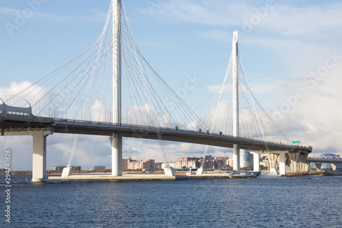 Cable-stayed bridge over a large river on a sunny day © Andrey