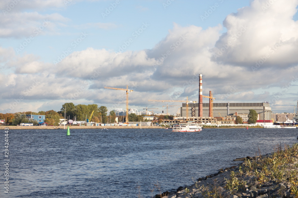 River landscape with boats on a sunny day