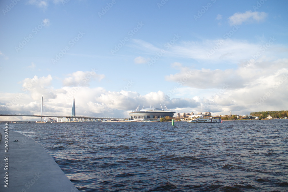River landscape with boats on a sunny day River landscape with boats on a sunny day
