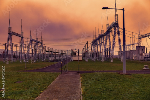 Electrical power station. Sunset sky.