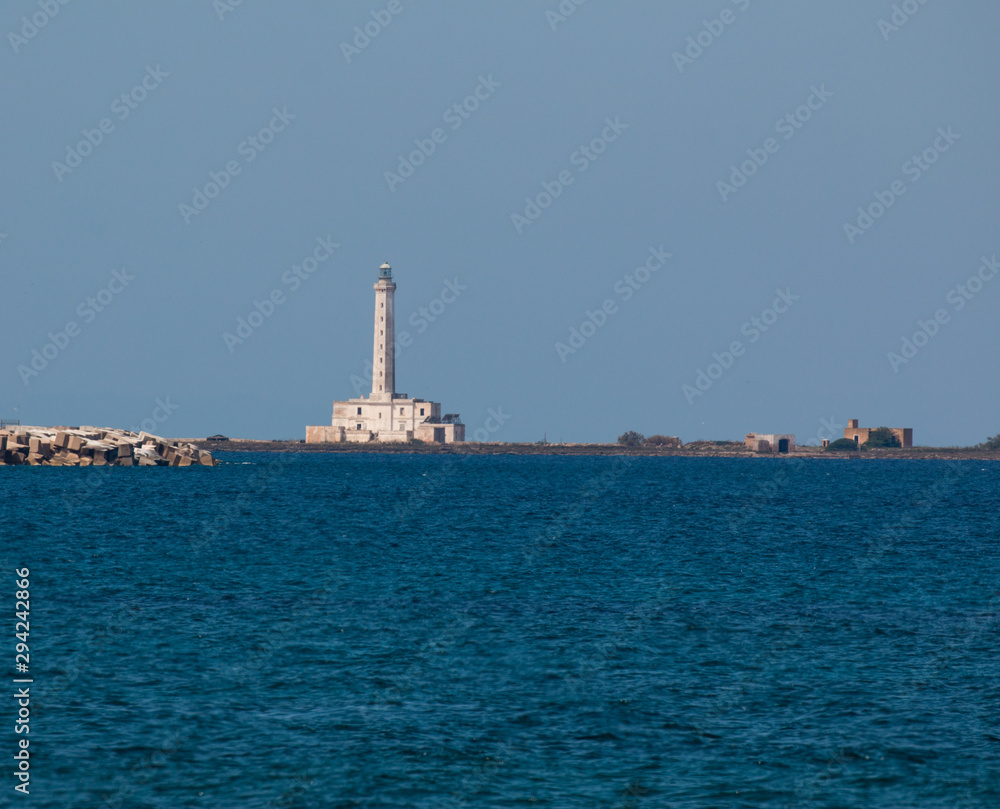 Lighthouse near ionian sea (St Andrea Island), Gallipoli, Salento, South Italy