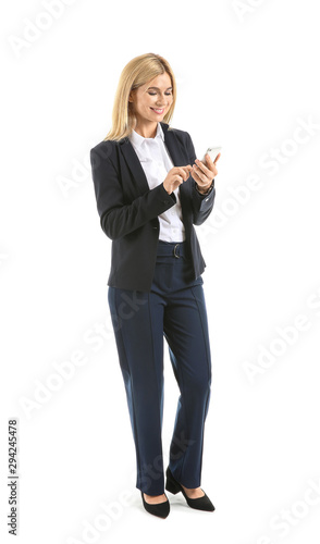 Beautiful stylish businesswoman with mobile phone on white background
