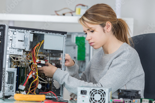 student girl in electronics laboratory
