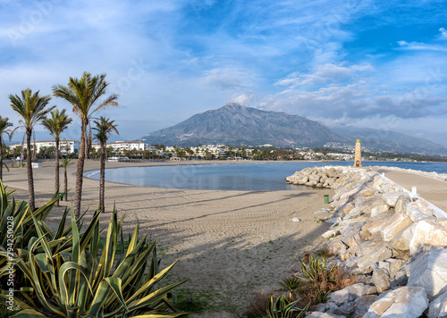 Sandy beach and mountain near Puerto Banus town, Andalusia, Spain