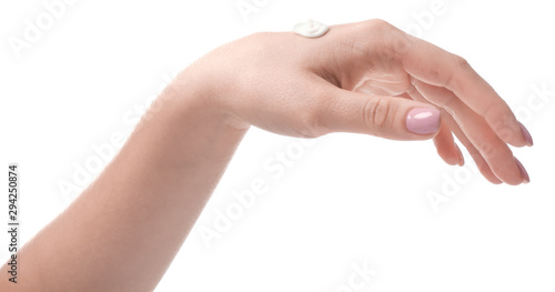 Female hand with cream on white background