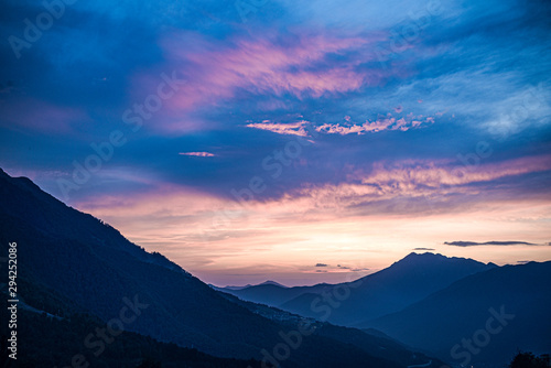 Majestic mountain landscapes of the Caucasus mountains in Russia . Cloudy sunset.