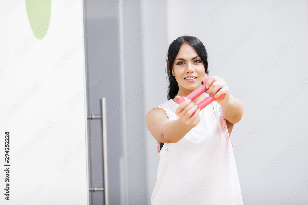 Healthy Lifestyle. Fitness woman doing exercises in gym. Healthy Lifestyle. Fitness woman doing exercises in gym.