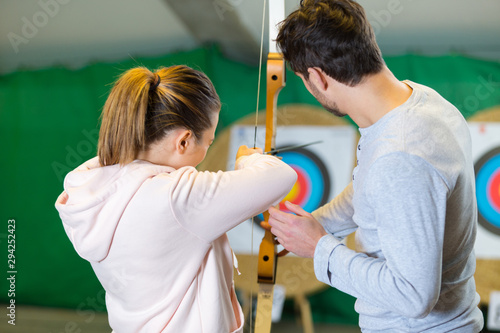 Foto portrait of people and archery center