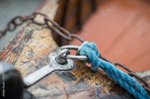 Close up of wooden boat with rope knot