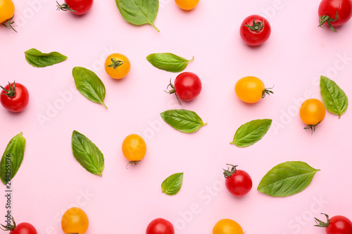 Wallpaper Mural Different fresh tomatoes with basil on color background Torontodigital.ca