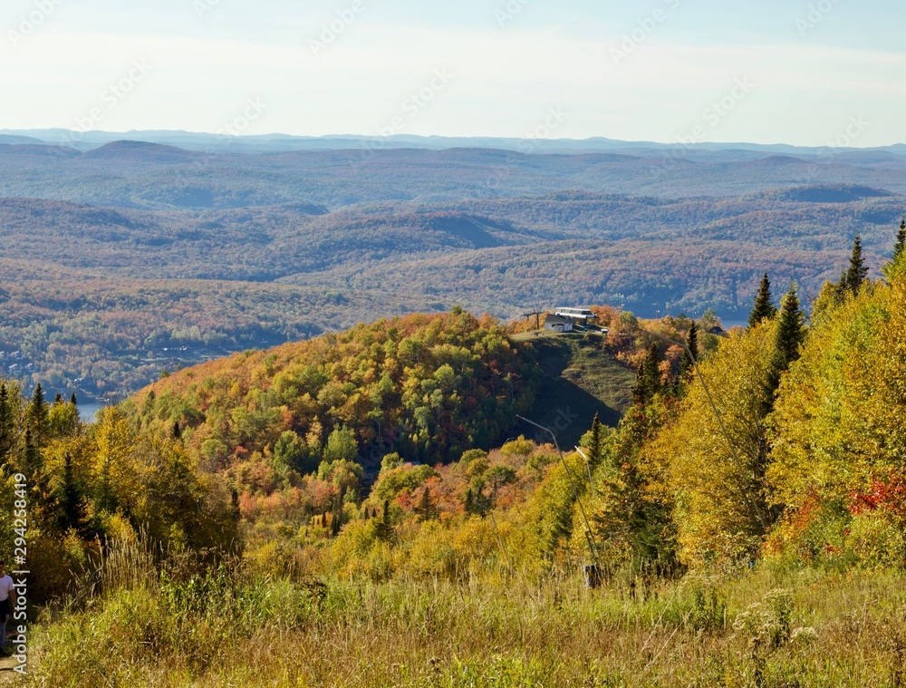 Fototapeta premium Fall mountain landscape with colorful foliage and lakes