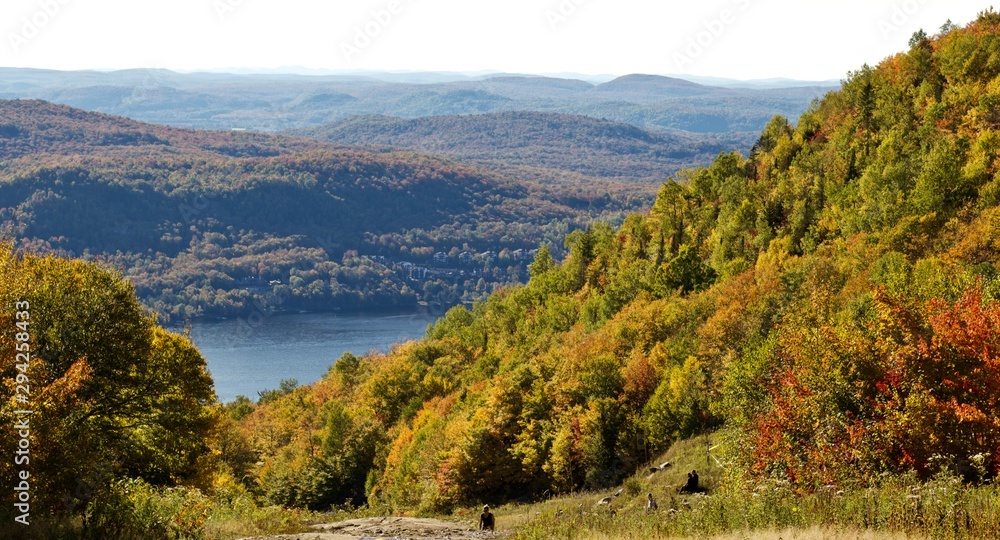 Fall mountain landscape with colorful foliage and lakes