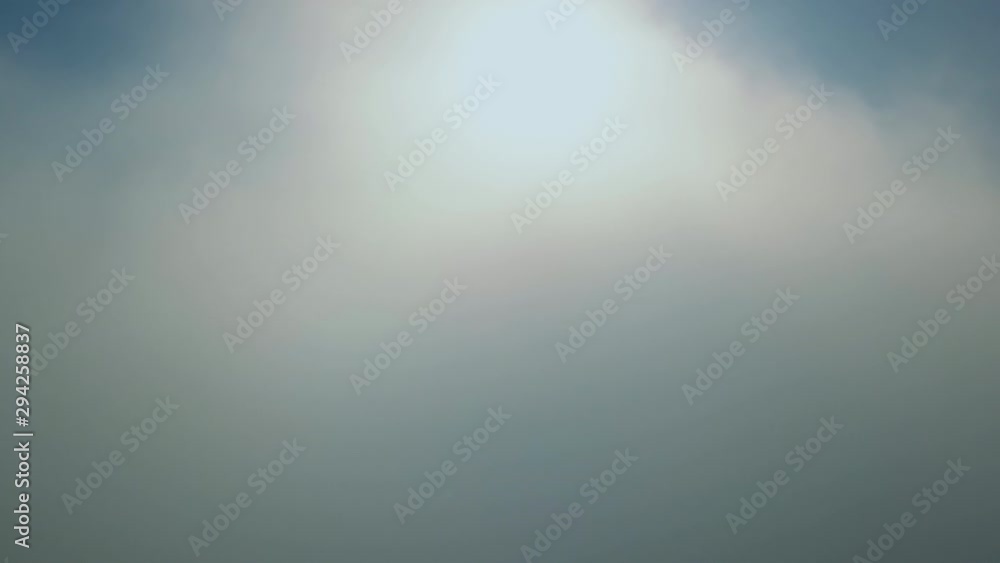Aerial view from above beautiful white clouds, day light. Drone flying high through fluffy clouds in blue sky. Cloudscape airplane window view Aerial view from above beautiful white clouds, day light. Drone flying high through fluffy clouds in blue sky. Cloudscape airplane window view
