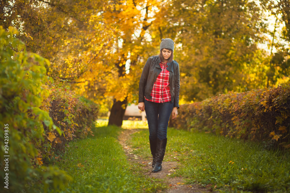 Autumn mood. Girl in the autumn park Autumn mood. Girl in the autumn park