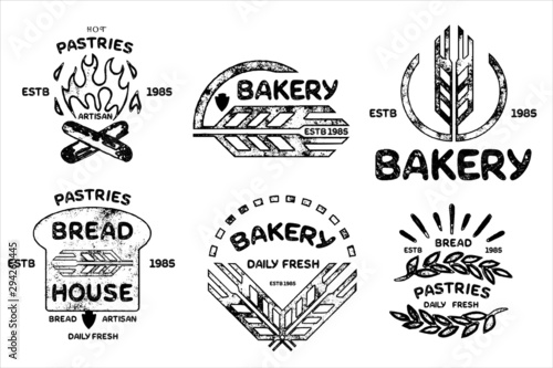 Bakery logotypes set. Bakery vintage design elements, logos, badges, labels, icons and objects. Vector illustration. Textured Version. Original Letters and Numbers.