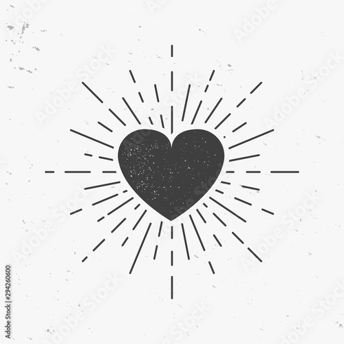 Heart icon with light rays. Vintage heart with stamp effect. Vector illustration photo