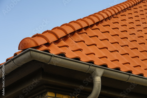 Corner of the house with gutter
