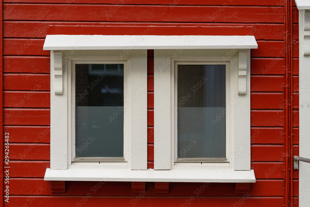 Fototapeta premium Old red wooden wall with window