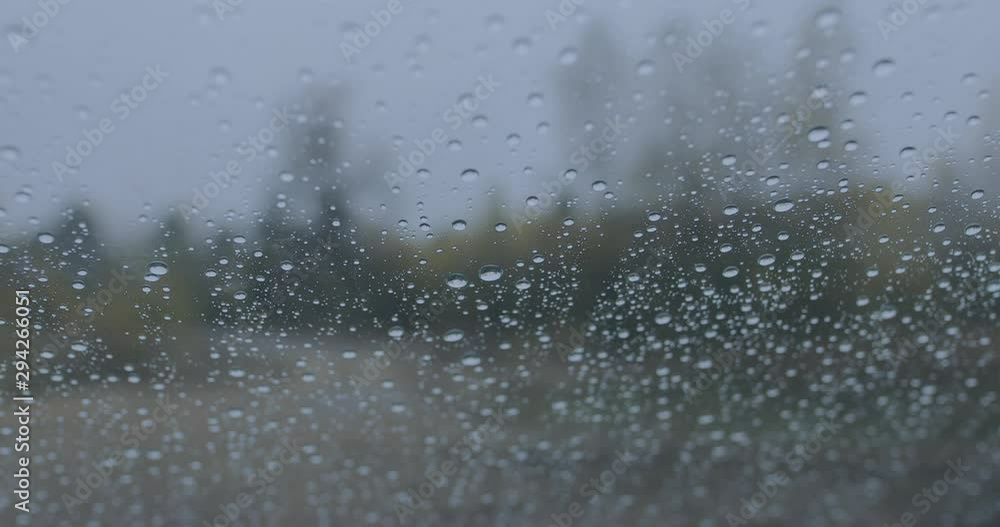 Raindrops on the automobile window, background Raindrops on the automobile window, background