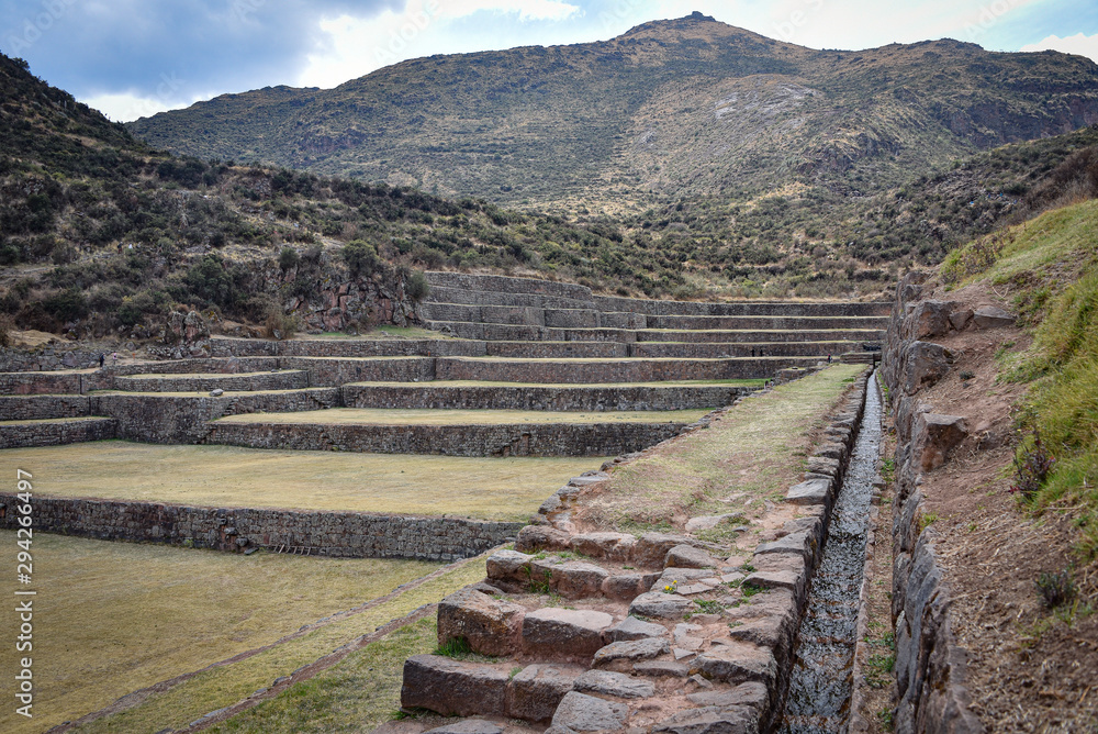 Inca water channels and stone terraces at the Tipon archaeological site, just south of Cusco, Peru