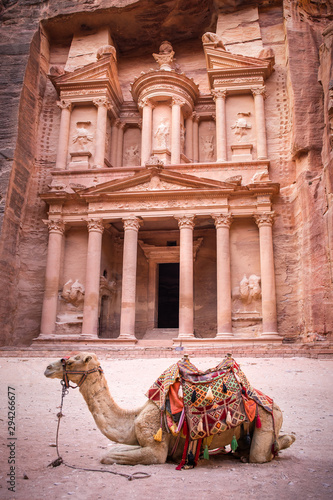 The Treasury temple (Al Khazneh) and a camel used for tourist transportation, Petra Jordan