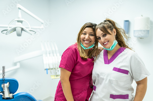 Two Female Dentist Smiling to the Camera