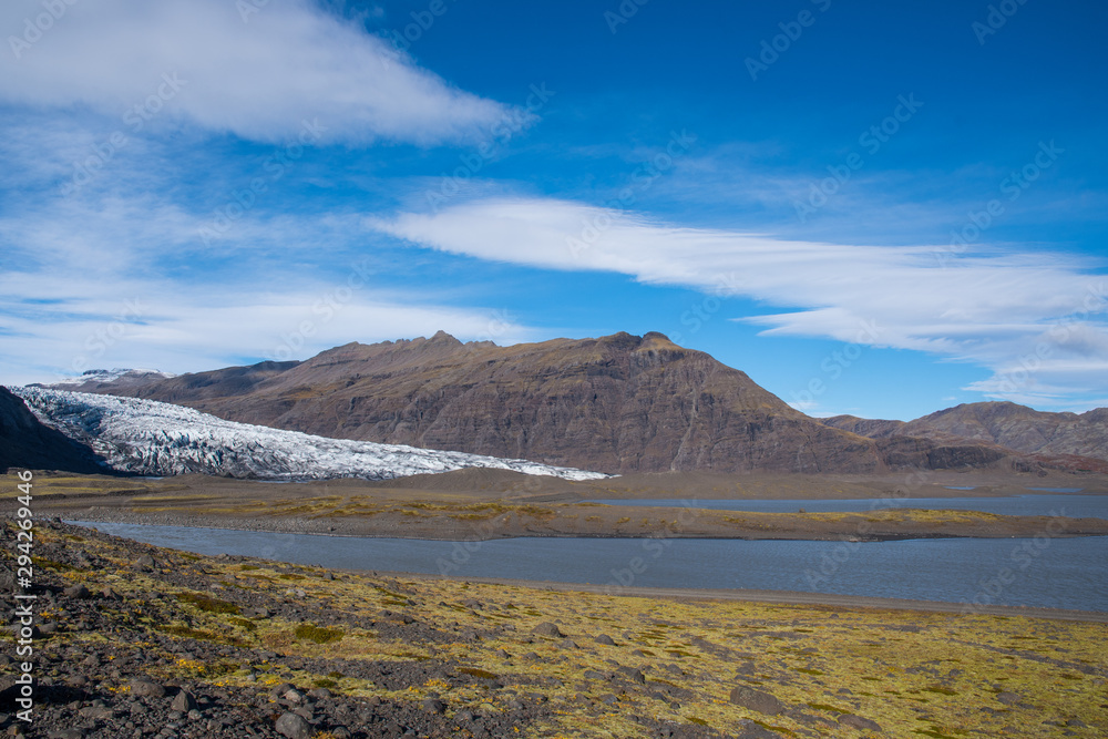 River Holmsa, Glacier Flaajokull and mountain and Flafjall mountain in Iceland River Holmsa, Glacier Flaajokull and mountain and Flafjall mountain in Iceland