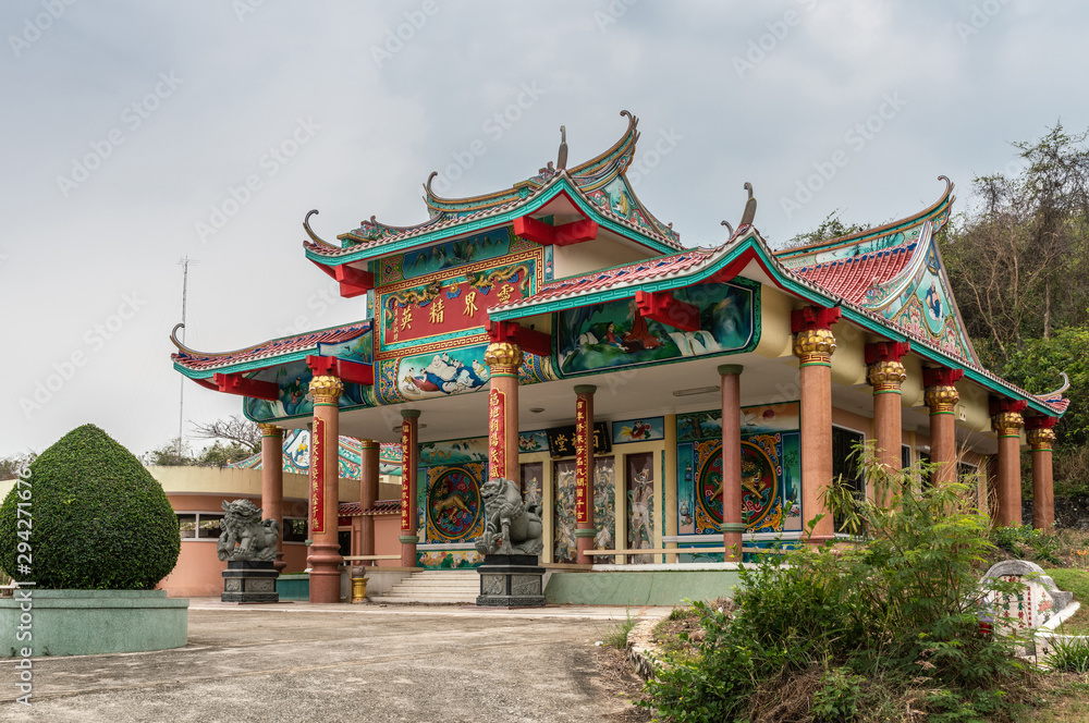 Bang Phra, Thailand - March 16, 2019: Chao Pho Khao Chalak Chinese Cemetery. Reunion hall and shrine for mourning families in elaborate architecture and colorful decorations. Bang Phra, Thailand - March 16, 2019: Chao Pho Khao Chalak Chinese Cemetery. Reunion hall and shrine for mourning families in elaborate architecture and colorful decorations.