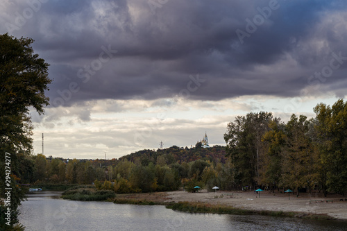Poltava Ukraine Vorskla river with view on Orthdox Church . Landscape photo
