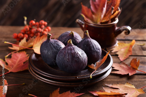 fresh figs on autumn table photo