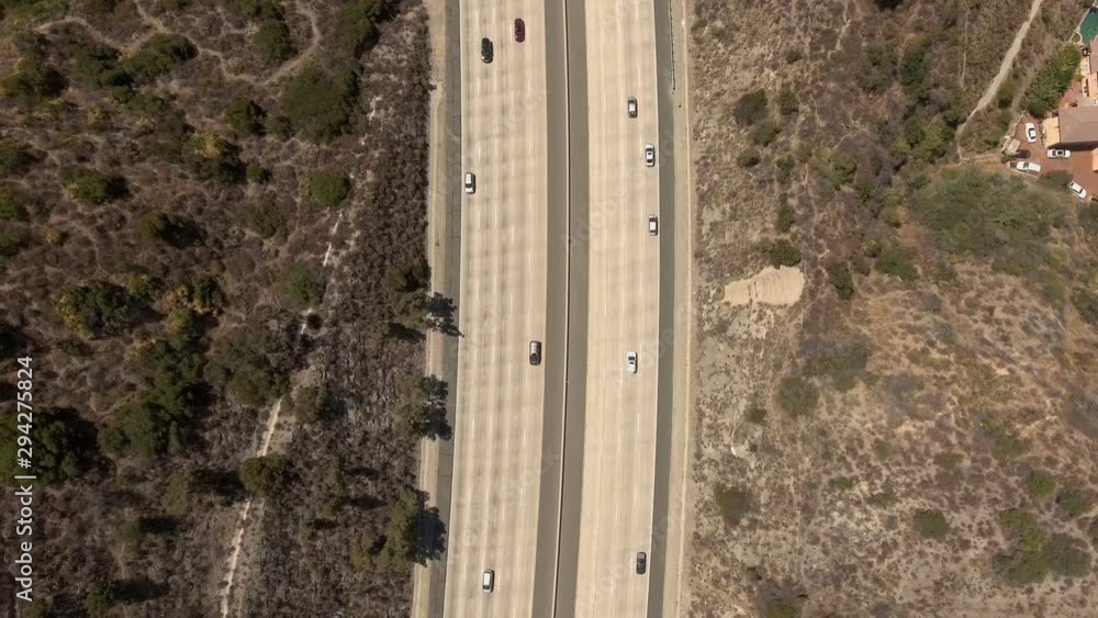 Aerial shot of road with moving traffic in California Aerial shot of road with moving traffic in California