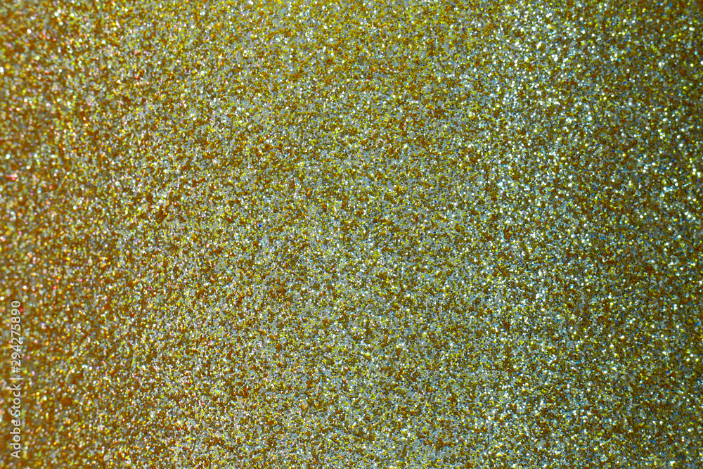 Grains of color. A pattern of small particles. Abstract golden background. Grains of color. A pattern of small particles. Abstract golden background.