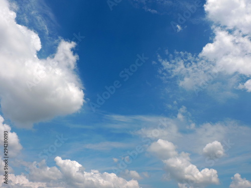 Blue sky background with clouds © Apisit